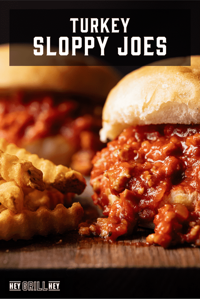 Turkey sloppy joes next to a pile of crinkle cut fries with text overlay - Turkey Sloppy Joes.