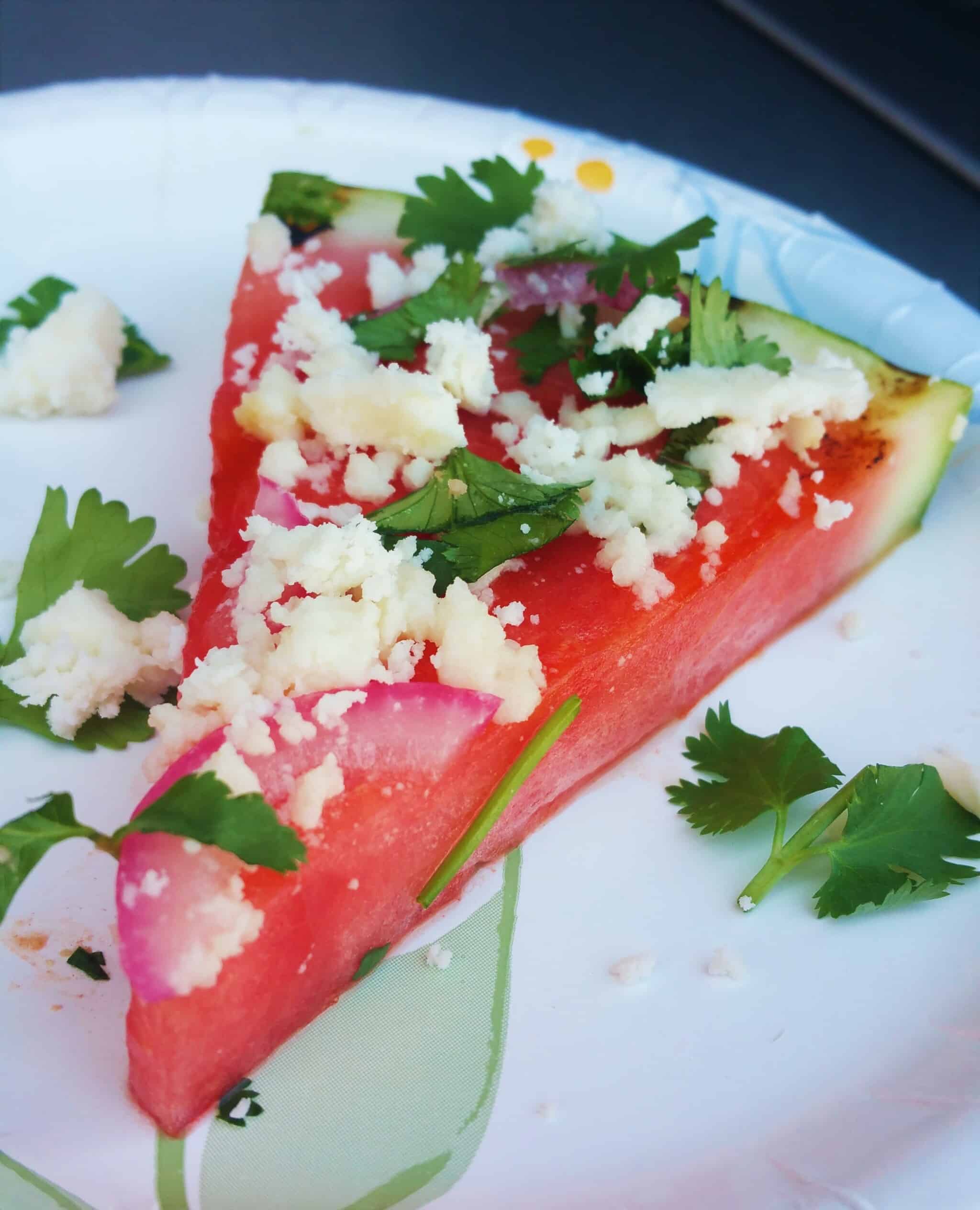 Grilled Watermelon Pizza with honey, lime, queso fresco and cilantro.
