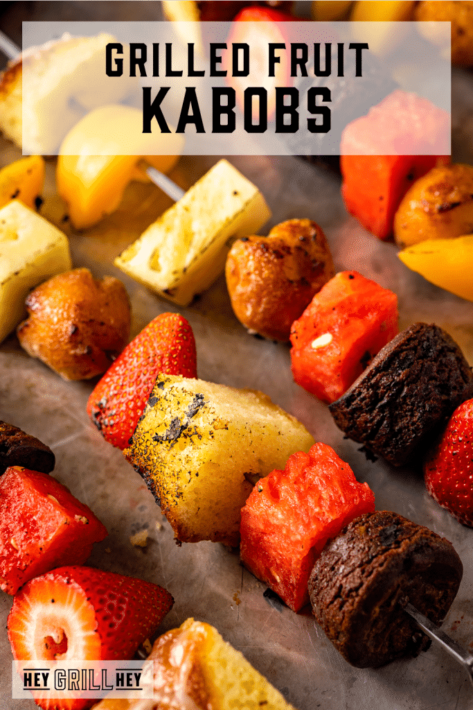 Grilled fruit and dessert on skewers with text overlay - Grilled Fruit Kabobs.