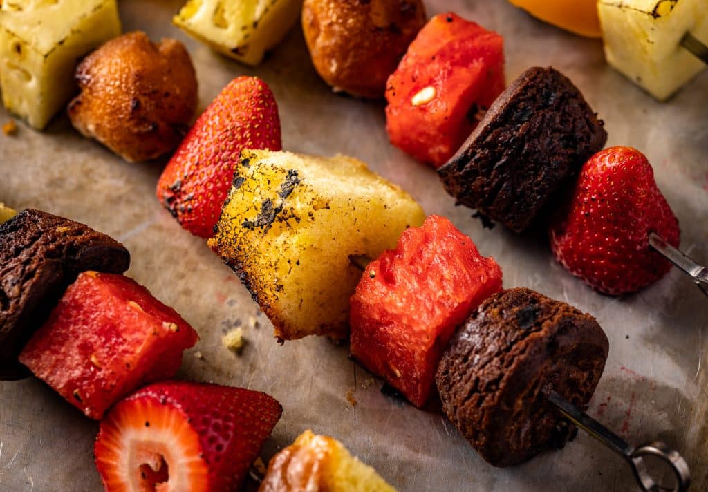 Grilled fruit and dessert on skewers.