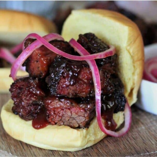burnt ends sandwich with pickled red onions