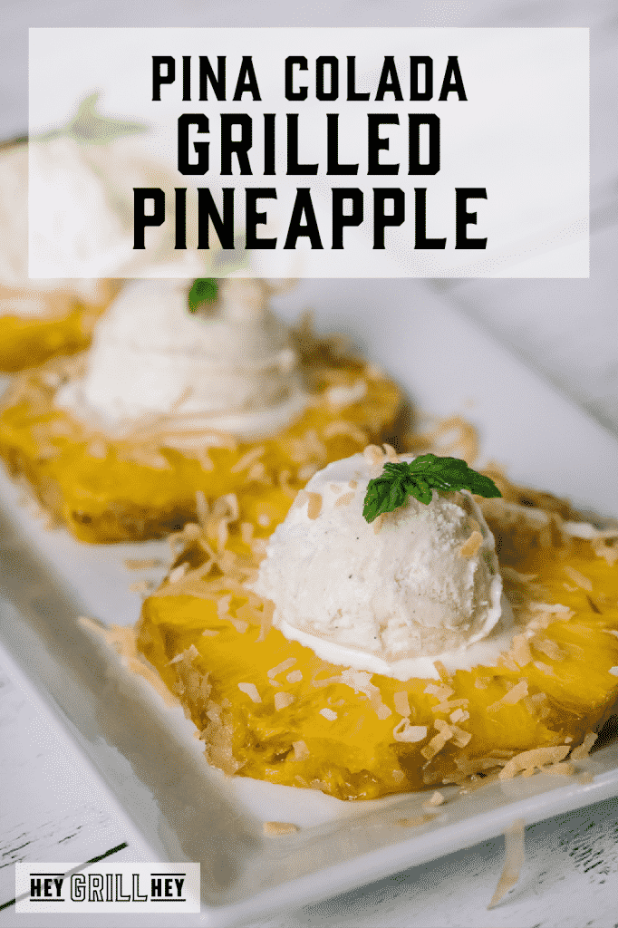 Three rings of grilled pineapple topped with shredded coconut and ice cream with text overlay - Pina Colada Grilled Pineapple.