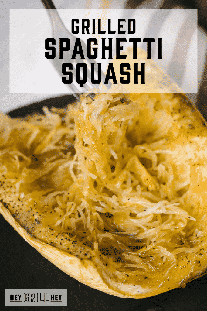 Grilled spaghetti squash on a fork with text overlay - Grilled Spaghetti Squash.