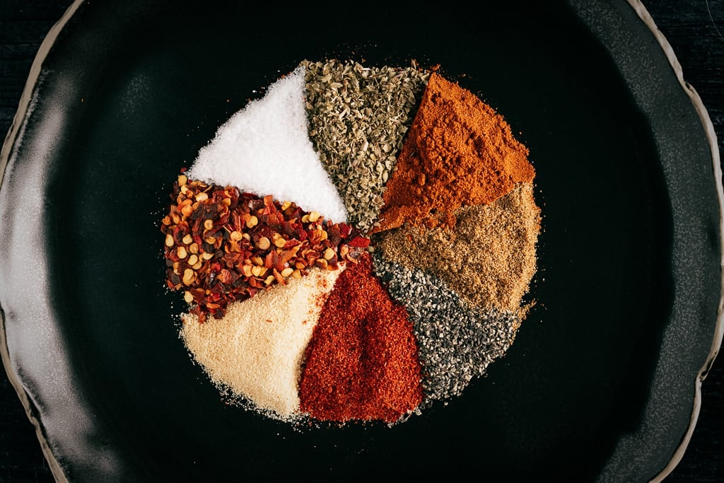 Ingredients for homemade fiesta rub arranged in a large mixing bowl.