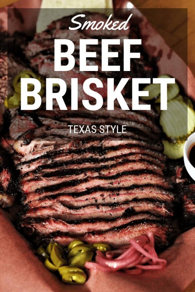 sliced smoked Texas style beef brisket on peach butcher paper