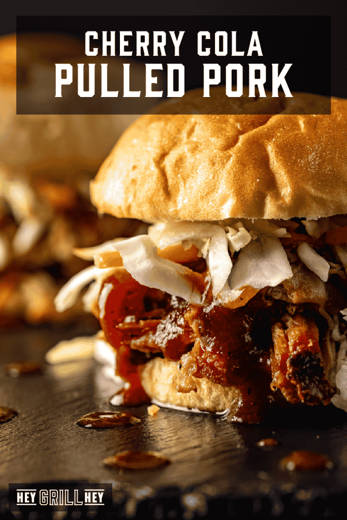 Pulled pork sandwiches on a serving platter with text overlay - Cherry Cola Pulled Pork.