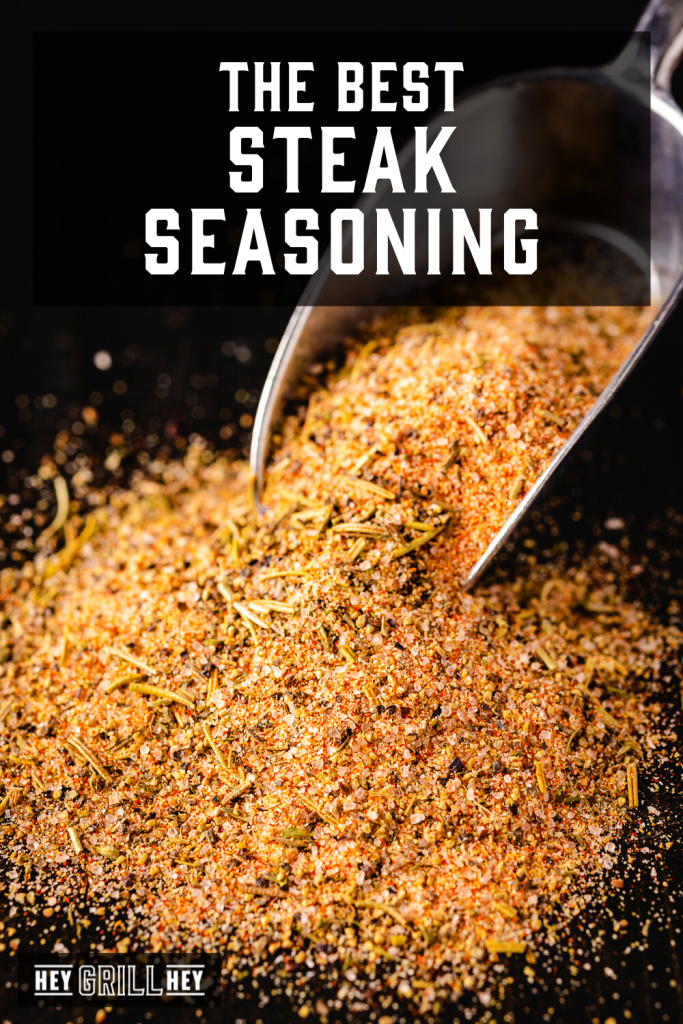 Steak seasoning pouring out of a large metal scoop with text overlay - The Best Steak Seasoning.
