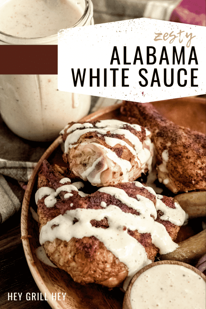Alabama white sauce drizzed over grilled chicken. Text overlay: "Zesty Alabama White Sauce."