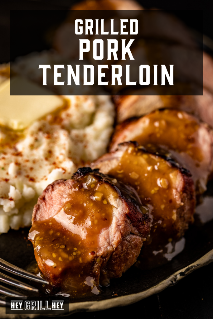 Slices of grilled pork tenderloin on a serving dish next to mashed potatoes with text overlay - Grilled Pork Tenderloin.