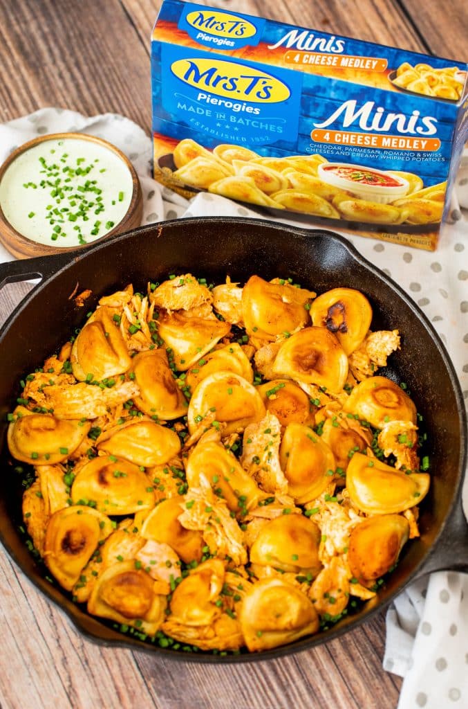 skillet of buffalo chicken and grilled pierogies