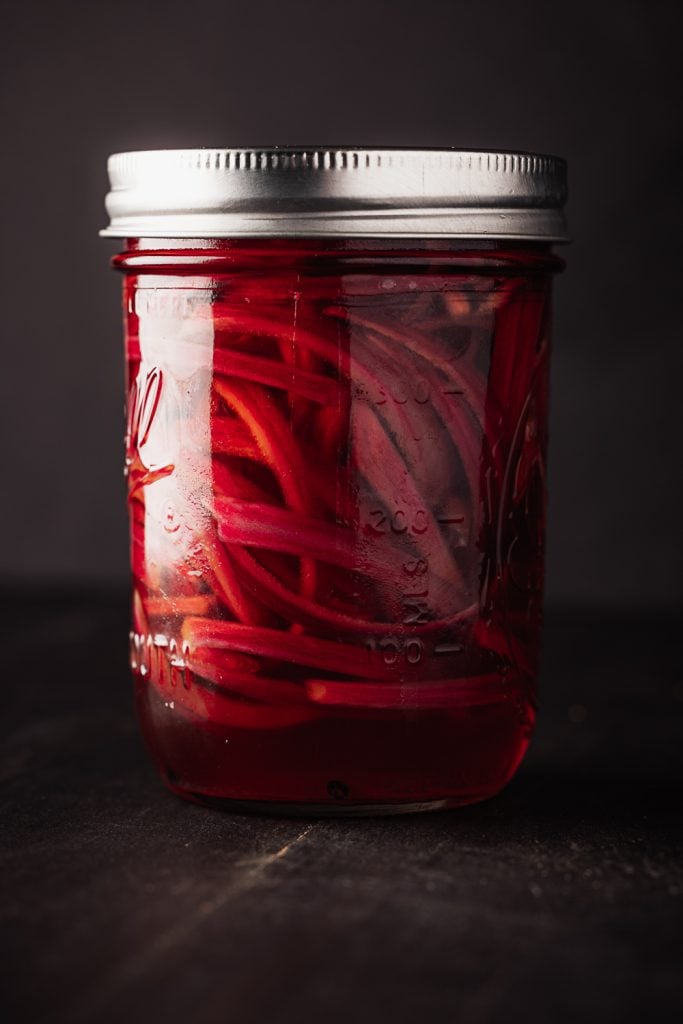 Jar of pickled red onions.