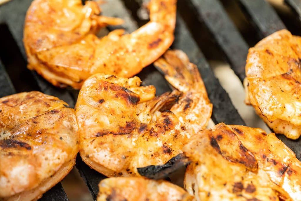 shrimp in the shell on the grill.