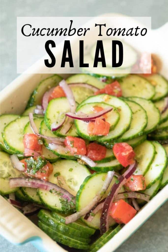 cucumber tomato salad in a serving dish.