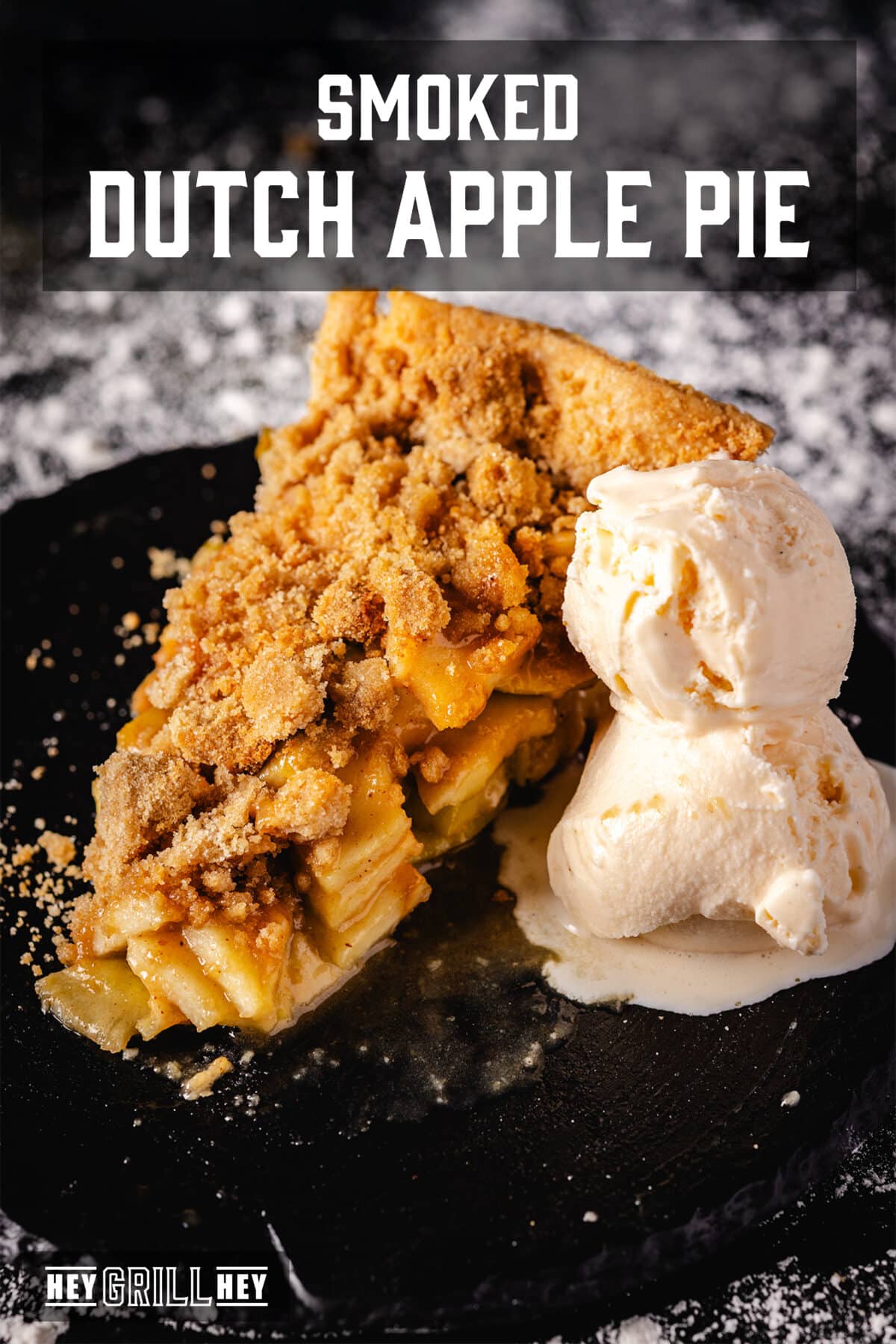 A slice of pie and a scoop of ice cream on a black plate. The text overlay reads "Smoked Dutch Apple Pie" at the top, and "Hey Grill Hey" at the bottom.