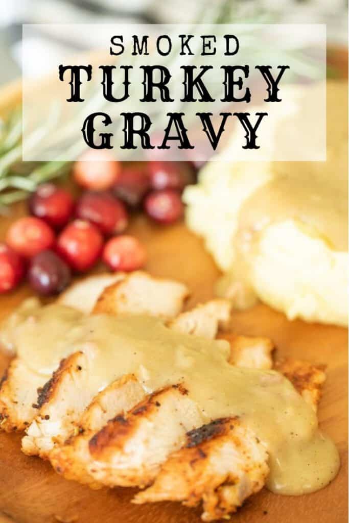 smoked turkey gravy over slices of smoked turkey and mashed potatoes on the side.