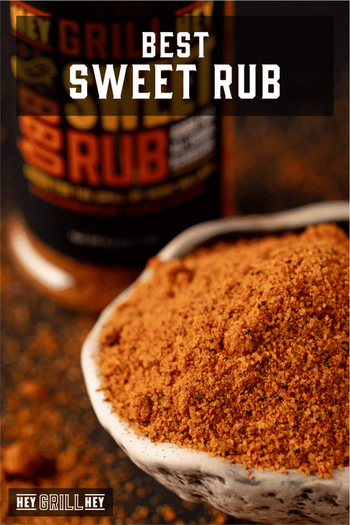 Bowl of sweet rub with a bottle of Hey Grill Hey Sweet Rub in the background with text overlay - Best Sweet Rub.