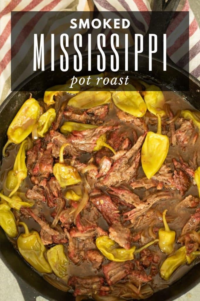 smoked Mississippi pot roast in a cast iron skillet.