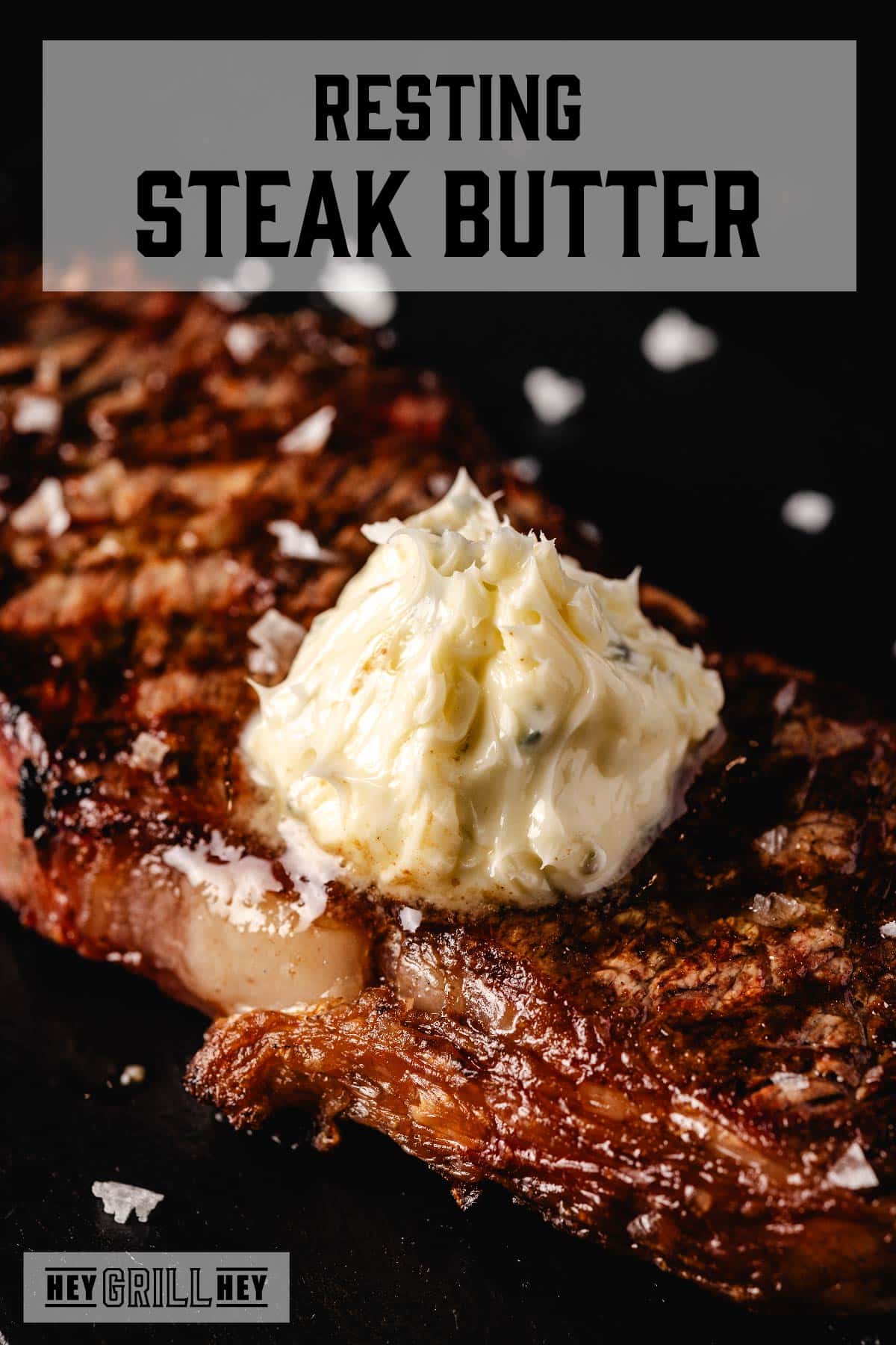 Grilled ribeye with a scoop of resting butter. Text reads "Resting Steak Butter."
