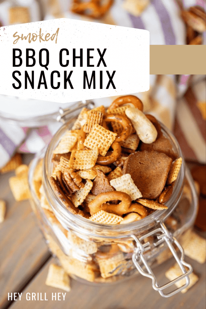 Smoked Chex mix in a hinged mason jar with text overlay: "Smoked BBQ Chex Snack Mix"