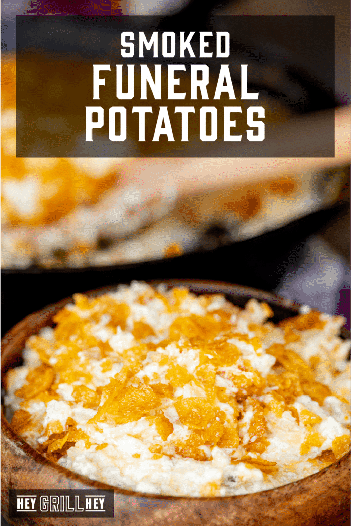 Smoked funeral potatoes in a wooden bowl with text overlay - Smoked Funeral Potatoes.