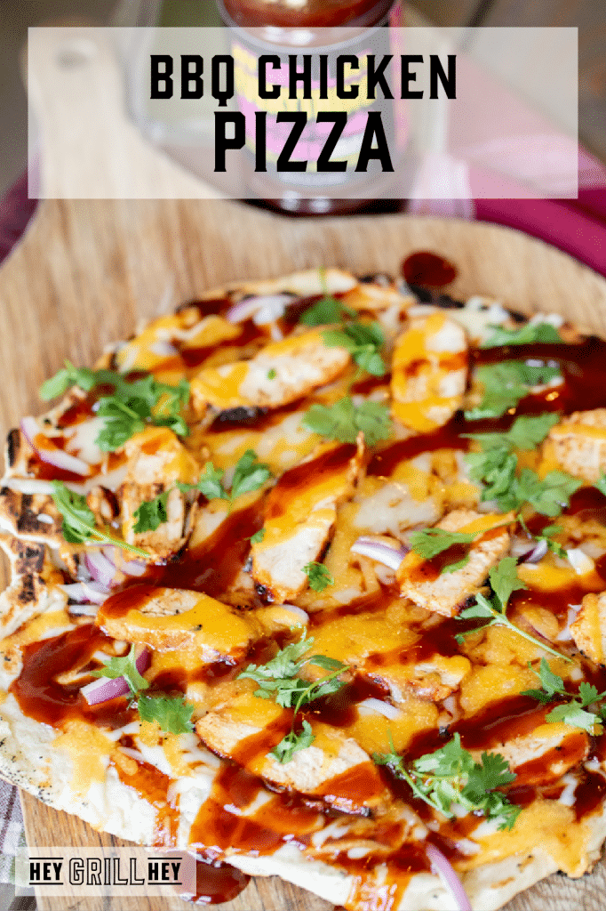 BBQ chicken pizza topped with BBQ sauce, chicken, cheese, and cilantro with text overlay - BBQ Chicken Pizza.