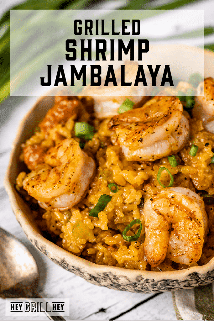 Grilled shrimp jambalaya in a serving bowl with text overlay - Grilled Shrimp Jambalaya.