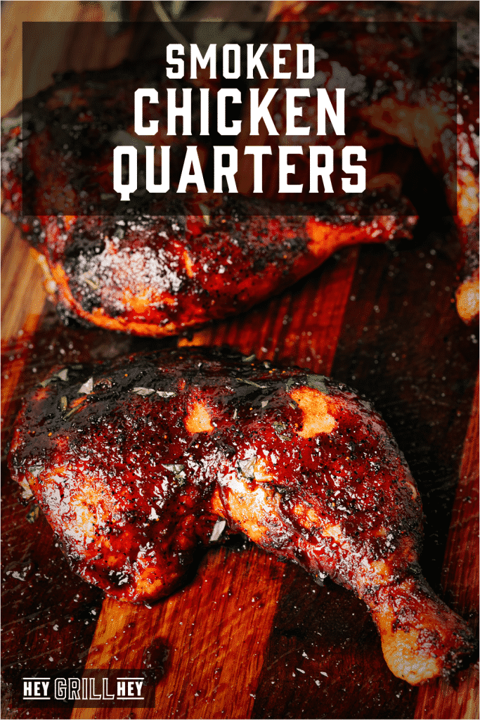 Smoked chicken quarters on a wooden cutting board with text overlay - Smoked Chicken Quarters.