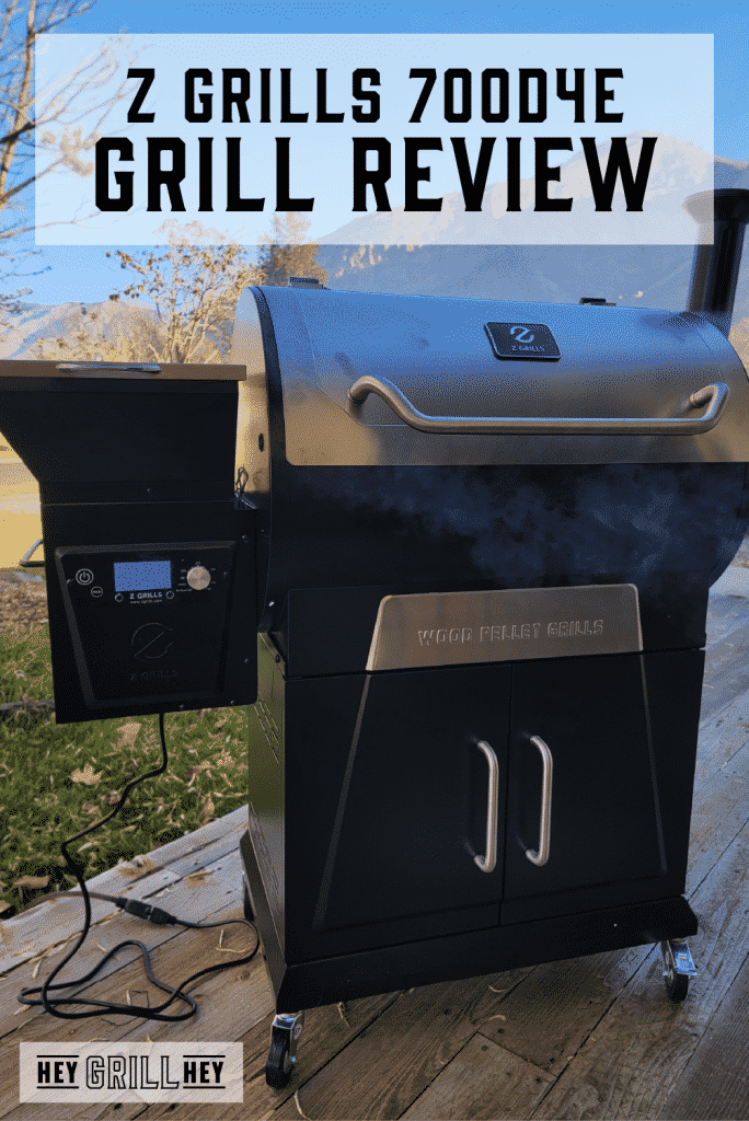 Z Grills 700D4E grill on patio with text overlay - Z Grills 700D4E Grill Review.