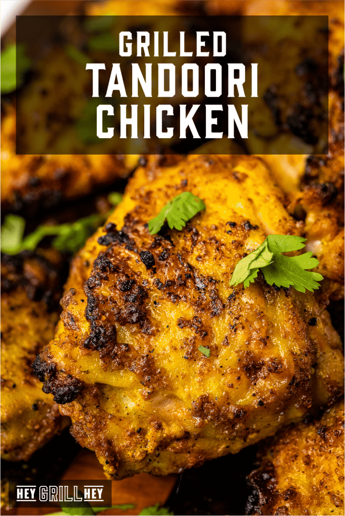 Grilled tandoori chicken thighs with text overlay - Grilled Tandoori Chicken.