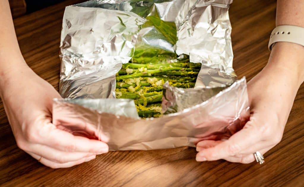 Seasoned asparagus in foil.