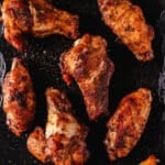 A closeup shot of cooked chicken flats and drumettes.