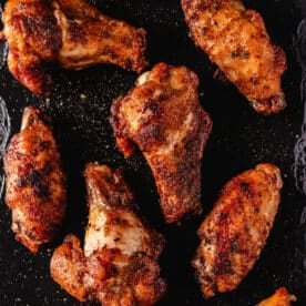 A closeup shot of cooked chicken flats and drumettes.
