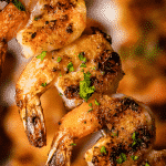 Grilled shrimp on a skewer.