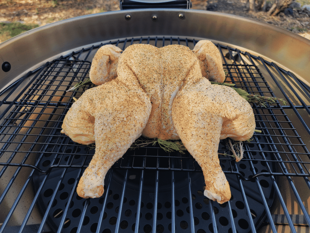 chicken on the grill grates