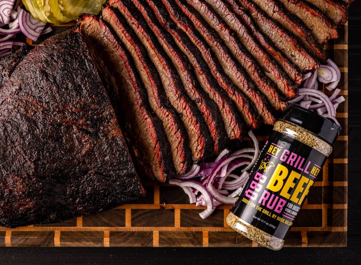 Sliced brisket flat on a serving platter.