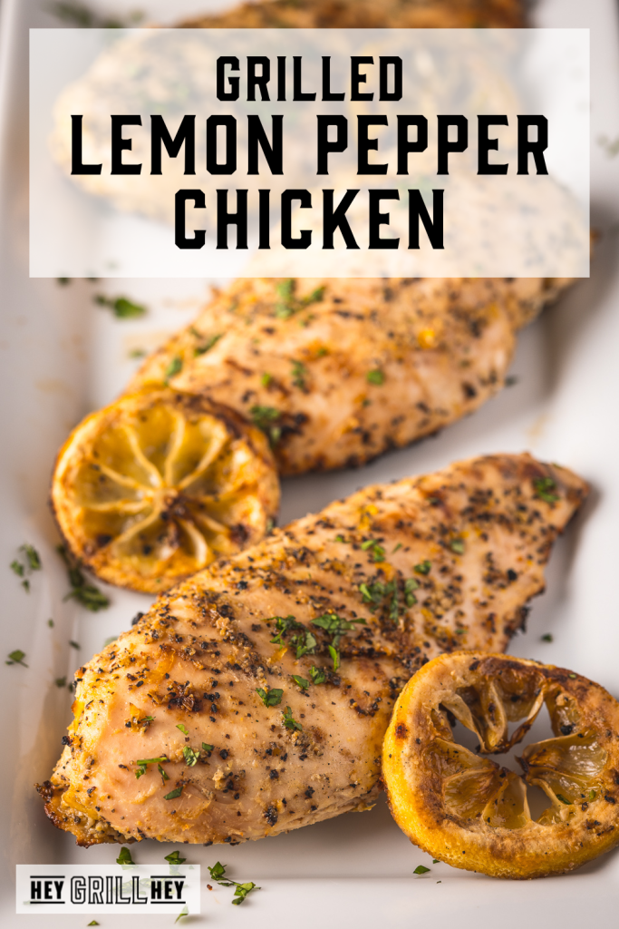 Grilled lemon pepper chicken breasts on a serving dish with text overlay - Grilled Lemon Pepper Chicken.