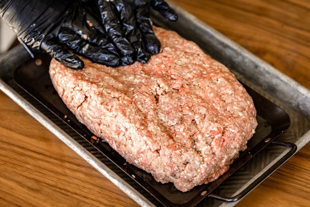 Meatloaf in a grill basket.