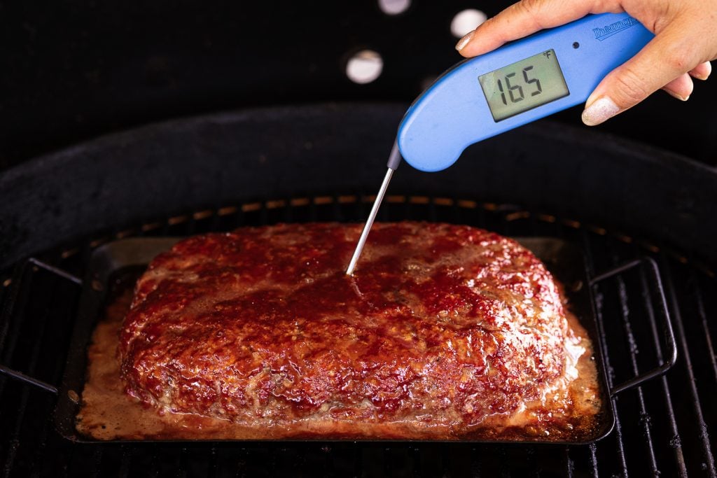 Meatloaf reading 165 degrees F with an instant read thermometer.