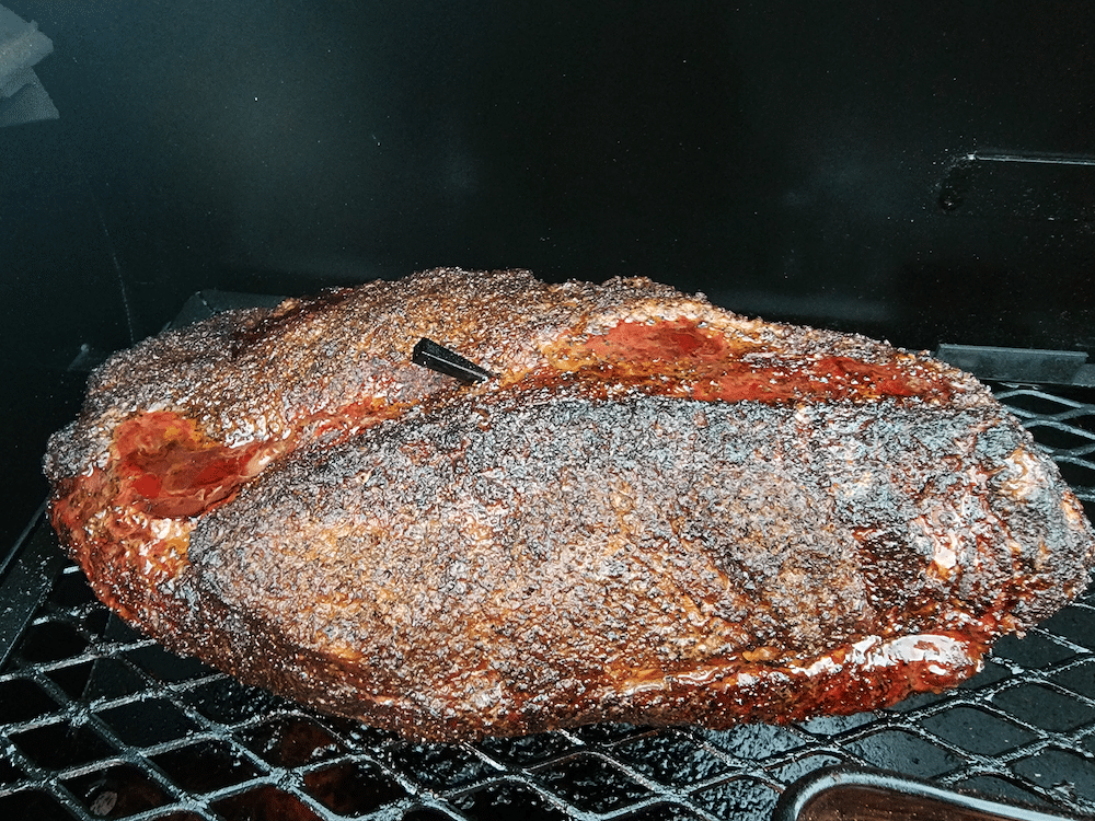 Meater Block probe placed in the center of a brisket on the grill