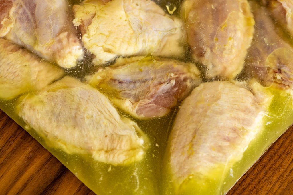 Chicken wings in a pickle juice brine.