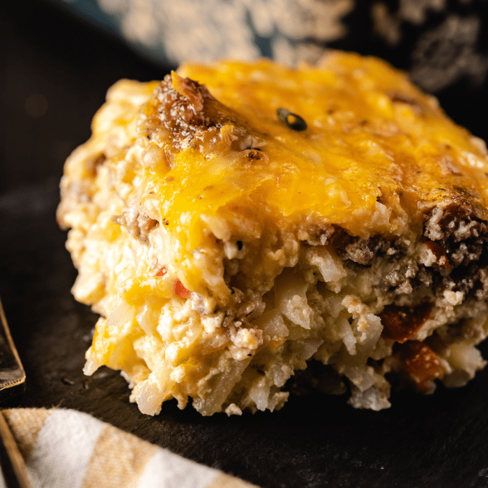 Slice of breakfast casserole on a plate.
