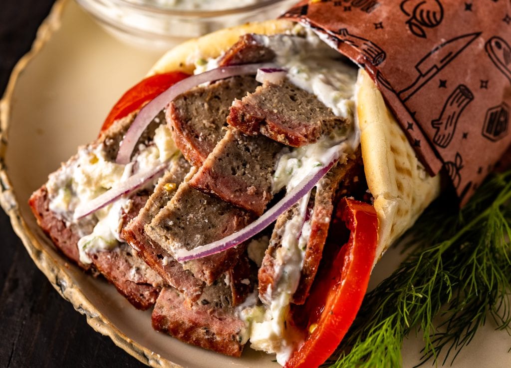 Gyro with smoked gyro meat on a serving platter.