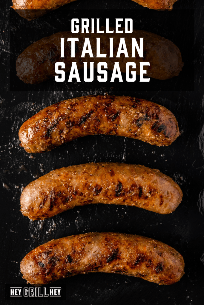 Grilled Italian sausage lined up on a serving platter with text overlay - Grilled Italian Sausage.