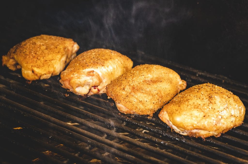 Chicken thighs on the smoker.