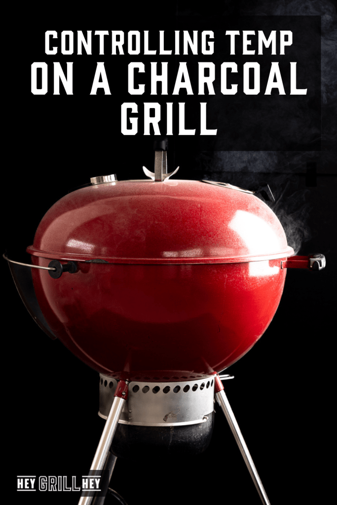 Smoke billowing out from a red charcoal grill with text overlay - Controlling Temp on a Charcoal Grill.