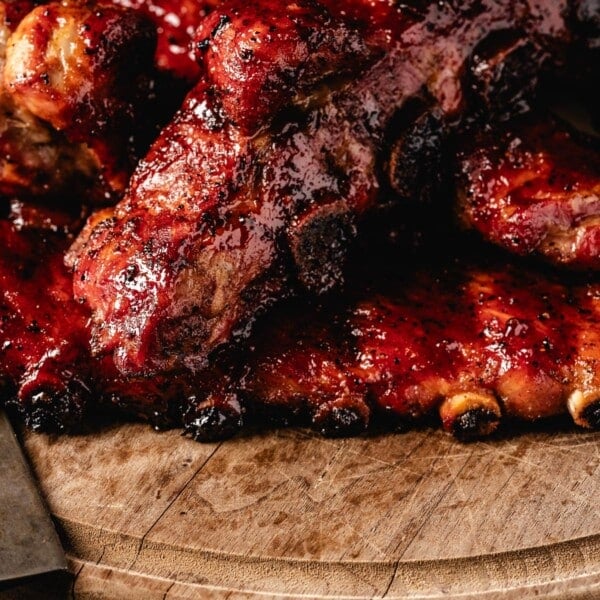 Smoked rib tips on wooden serving platter.