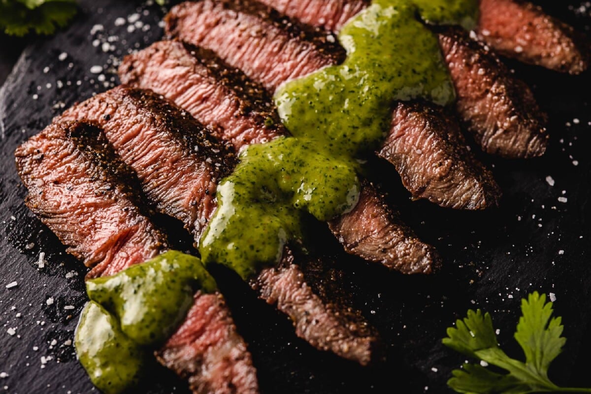 Grilled flap beef with chimichurri sauce.