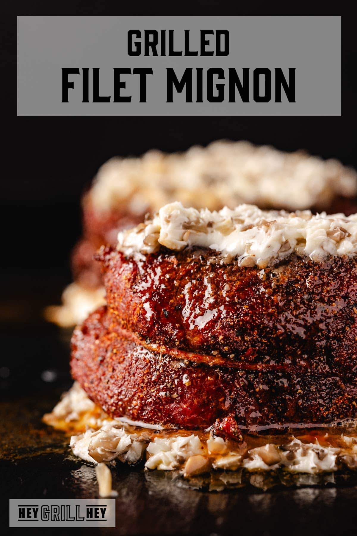 Grilled filets topped with butter. Text reads "Grilled Filet Mignon".