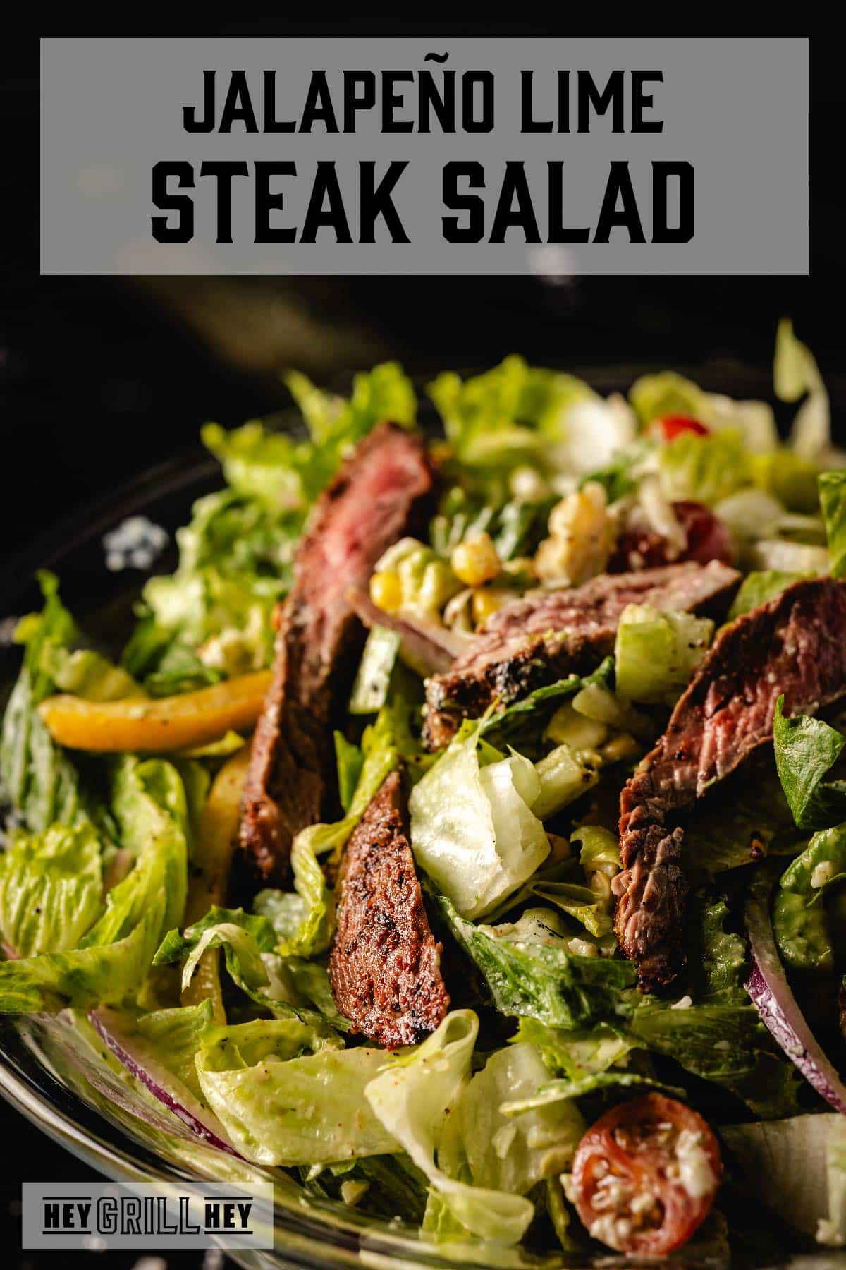 Steak salad in bowl. Text reads "Jalapeño Lime Steak Salad".