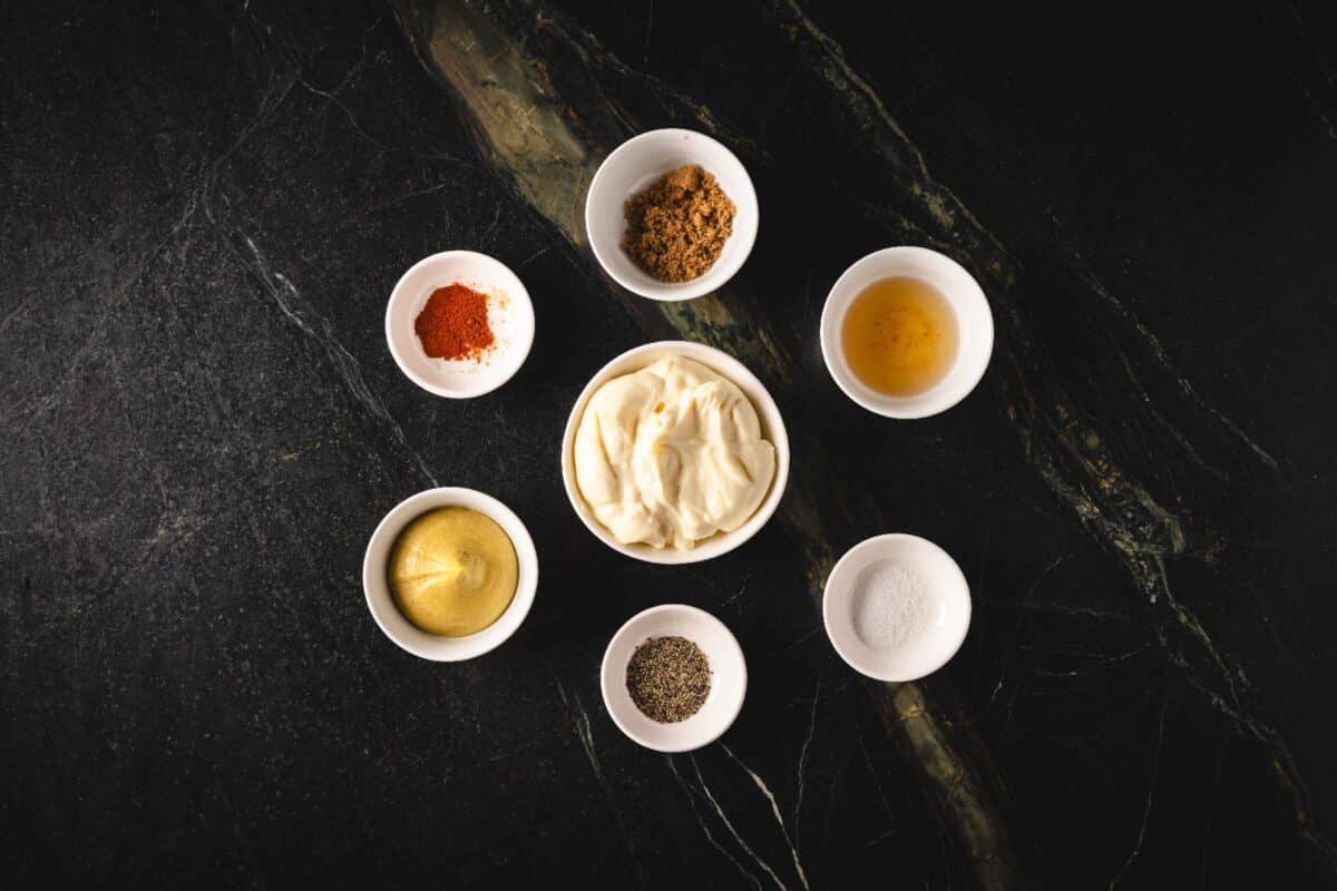 Ingredients for Dijon sauce in glass bowls.